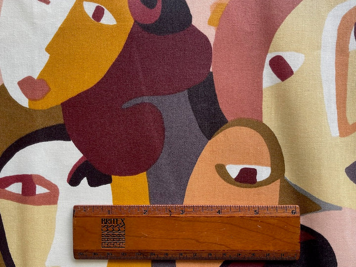 Ocher Crowded Faces Laminated Cotton (Made in France)