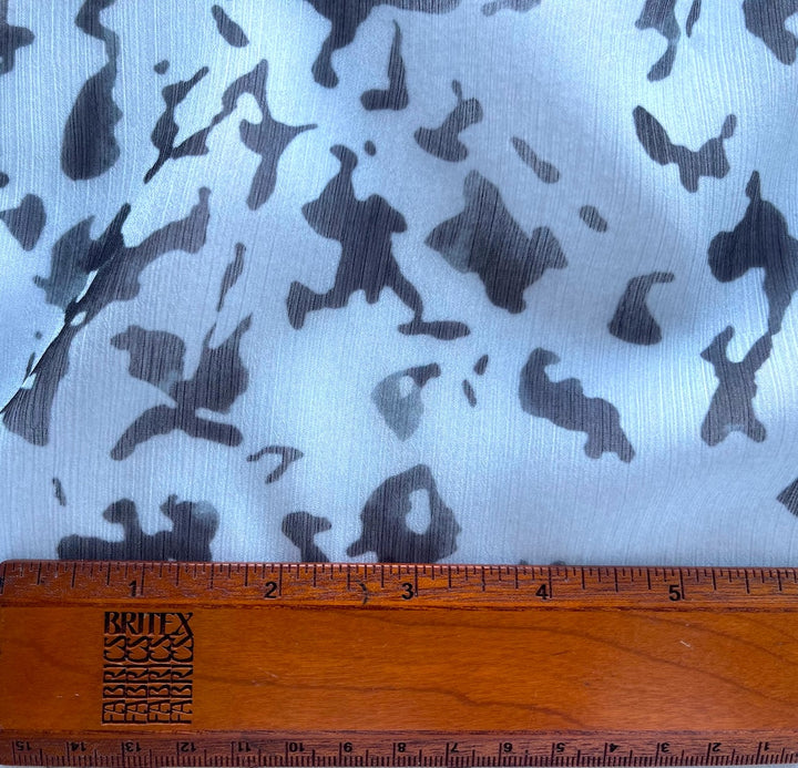 Semi-Sheer Raven Splatters on Light Sky Blue Crinkled Polyester Chiffon