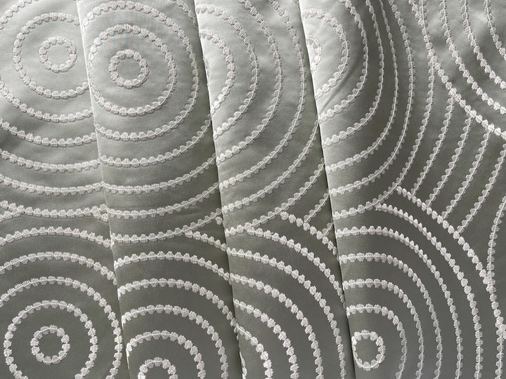 Embroidered Cloud White Concentric Circles on Dusted Pistachio Polyester Satin