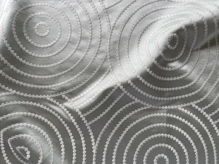 Embroidered Cloud White Concentric Circles on Dusted Pistachio Polyester Satin