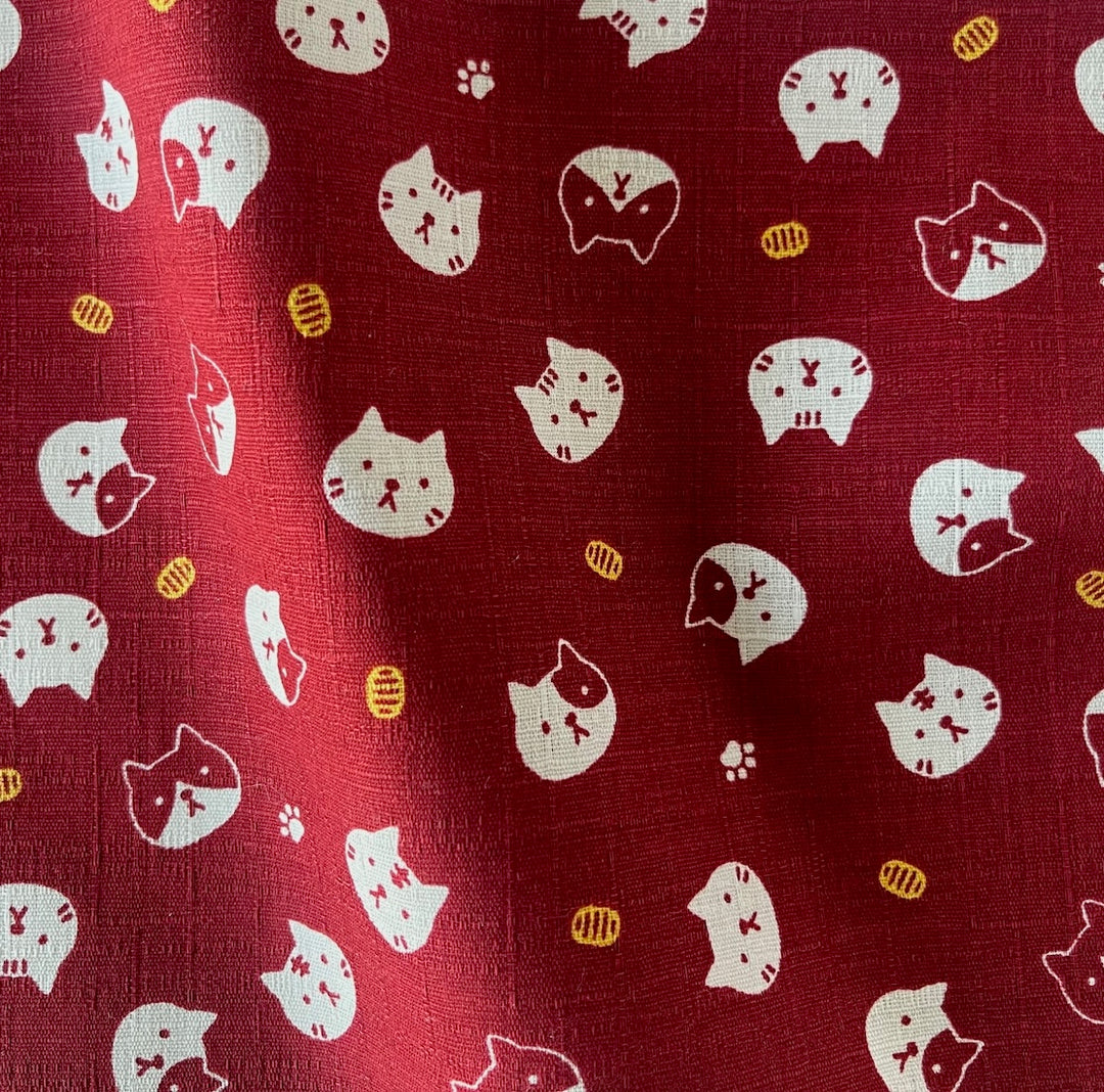 Fuku Fuku Serious Cat Heads on Brick Red Cotton Dobby (Made in Japan)