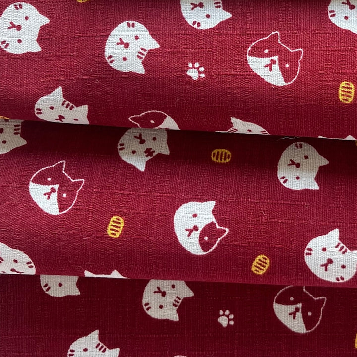 Fuku Fuku Serious Cat Heads on Brick Red Cotton Dobby (Made in Japan)