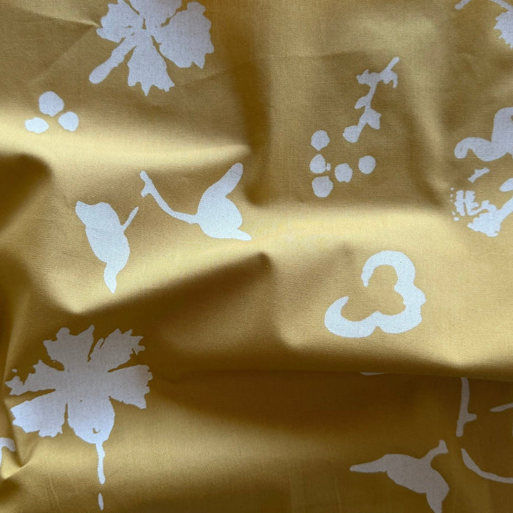 White Floral Silhouettes on Biscotti Cotton