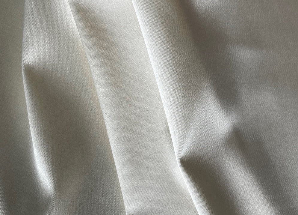 Glistening Candlelight Ivory Hammered Stretch Polyester Satin