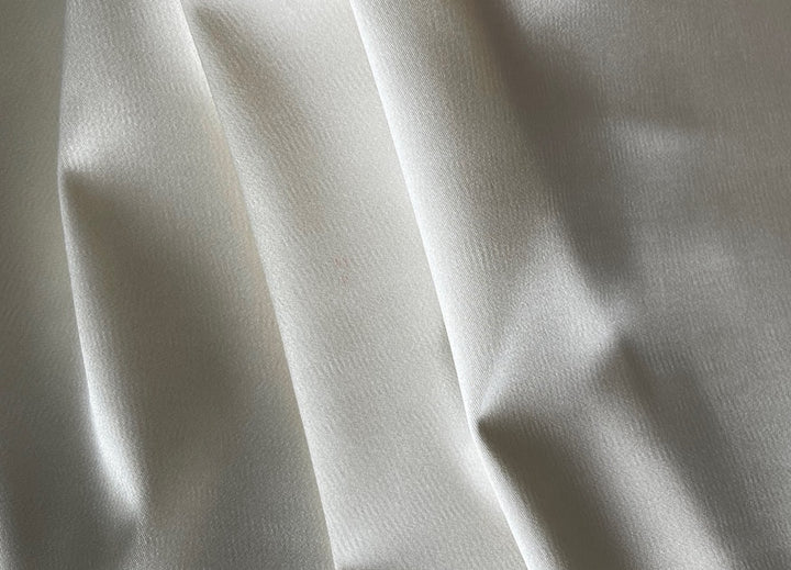 Glistening Candlelight Ivory Hammered Stretch Polyester Satin