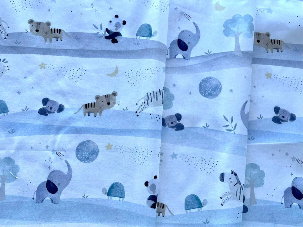 Parade of Pastel Creatures on Cloud White Quilting Cotton