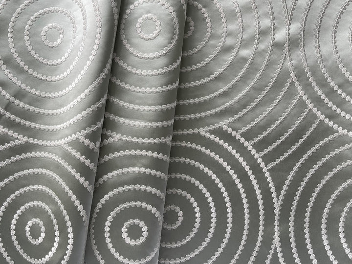 Embroidered Cloud White Concentric Circles on Dusted Pistachio Polyester Satin